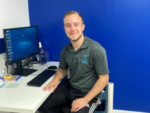 Nathan at desk sports massage lr