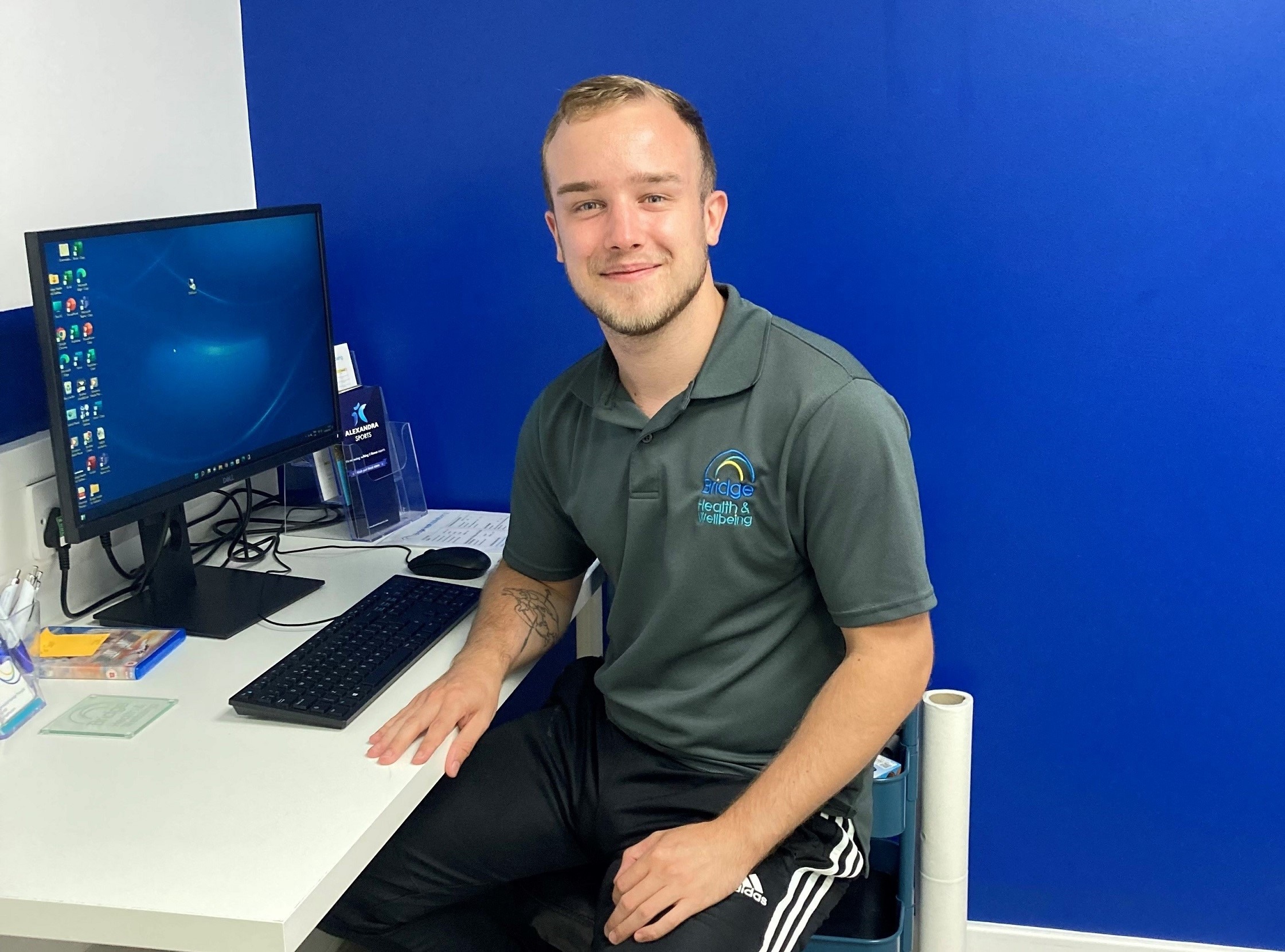 Nathan at desk sports massage lr cropped