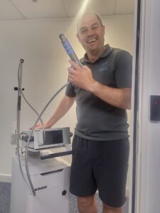 Paul O'Connell with shockwave therapy machine